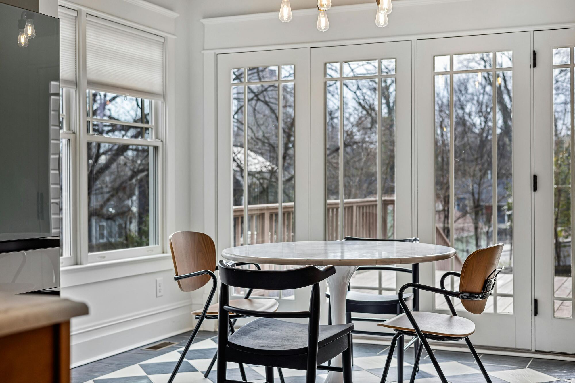 Dining area with natural light and modern decor in a Kaizen Homes custom build in Asheville, NC
