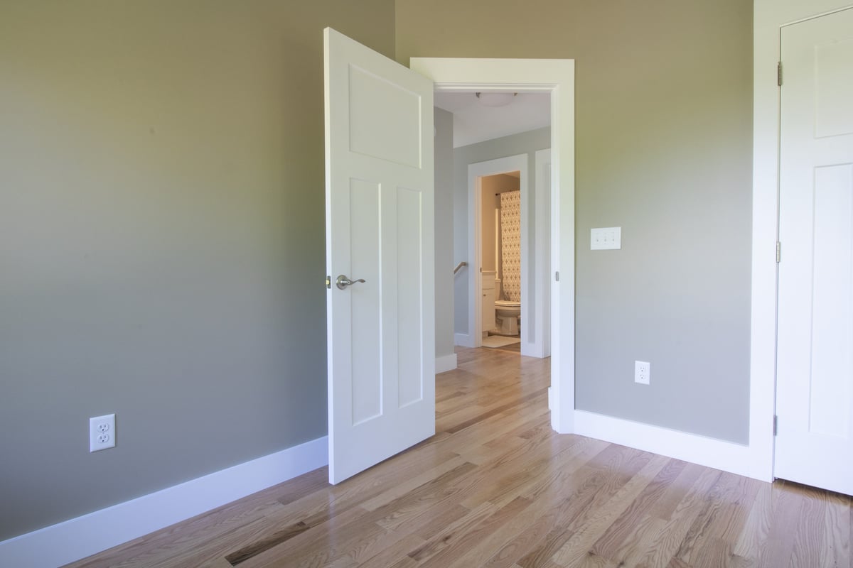 Bedroom entry showing bathroom access in a Kaizen Homes project in Canton, NC