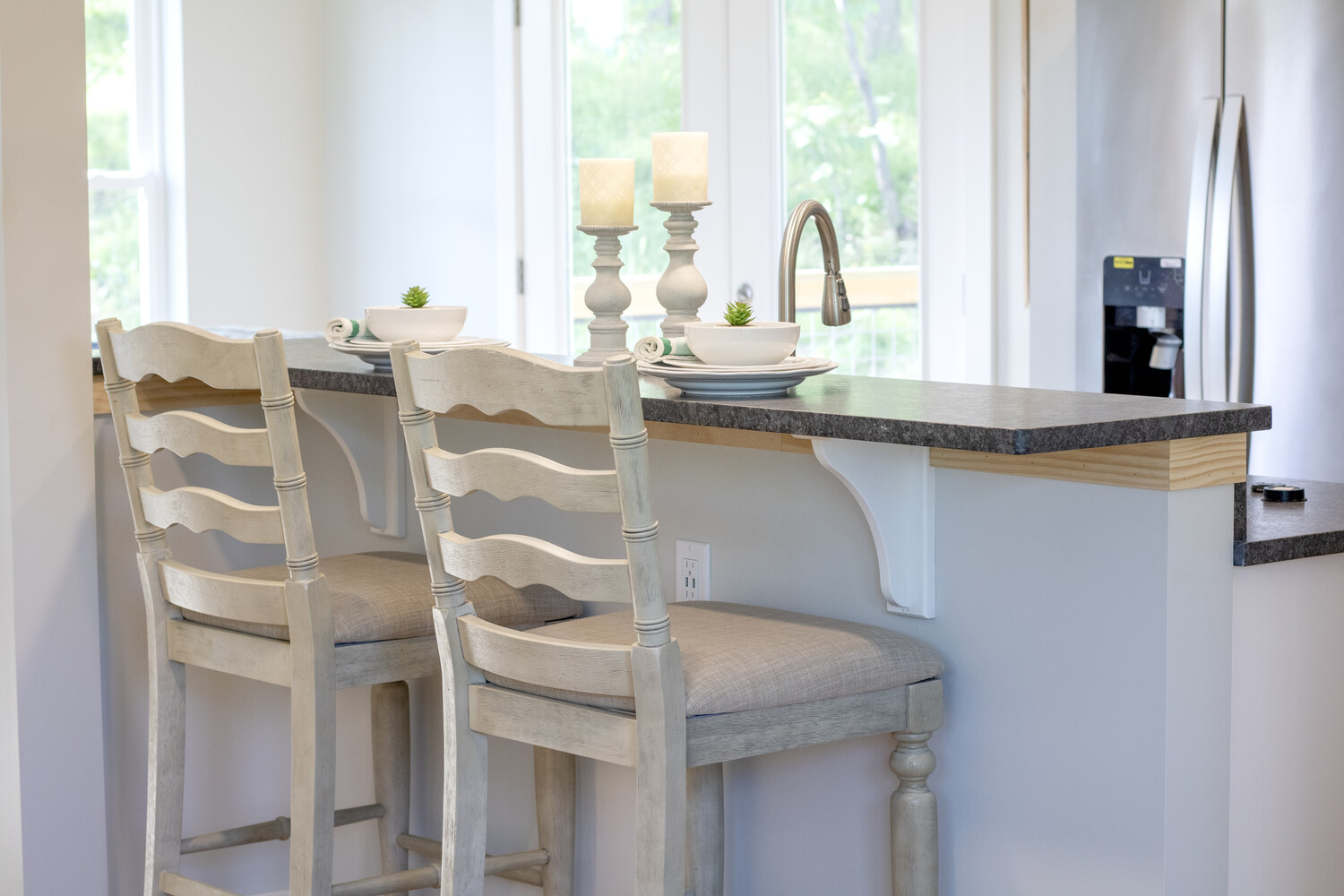 Custom kitchen island with bar seating in a Kaizen Homes home in Canton, NC Custom kitchen island with bar seating in a Kaizen Homes home in Canton, NC