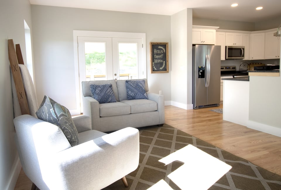 Open-concept living room and kitchen in a Kaizen Homes custom home in Canton, NC