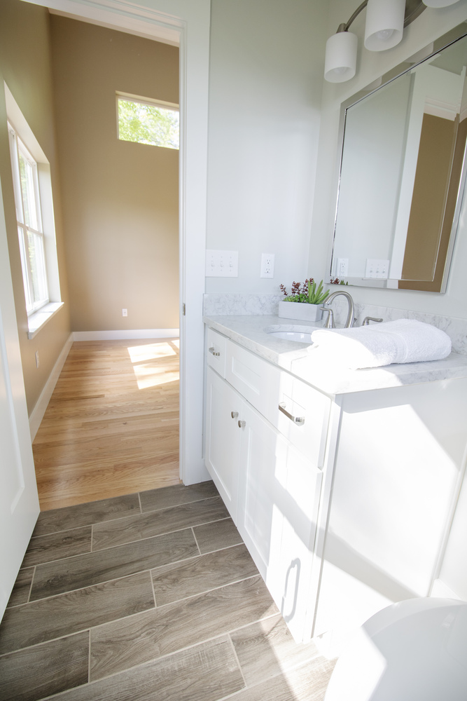 View from bathroom to bedroom in a Kaizen Homes master suite in Canton, NC