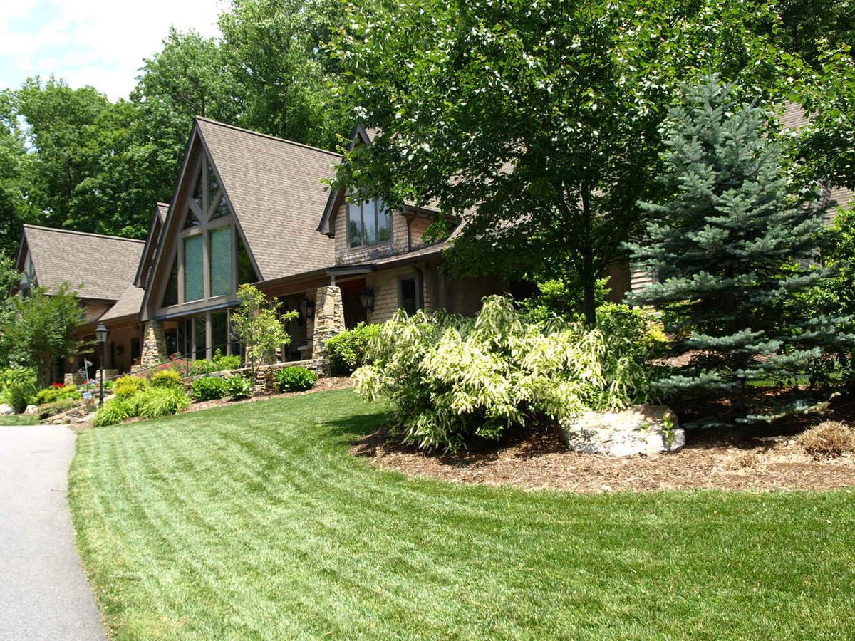 Custom home front lawn and landscaping by Kaizen Homes in Marshall, NC
