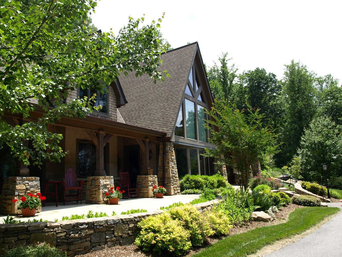 Garden walkway and front view of custom home by Kaizen Homes in Asheville, NC
