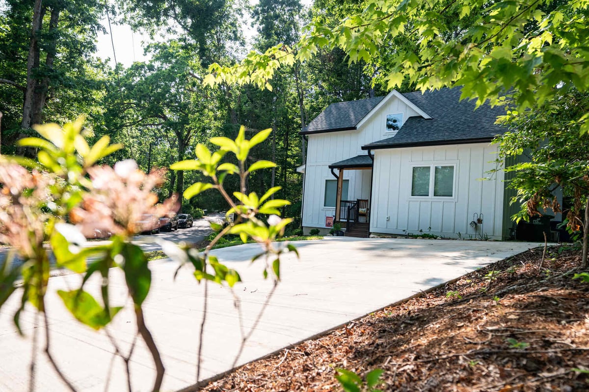 Bright side view of custom Kaizen Homes property in Black Mountain, NC