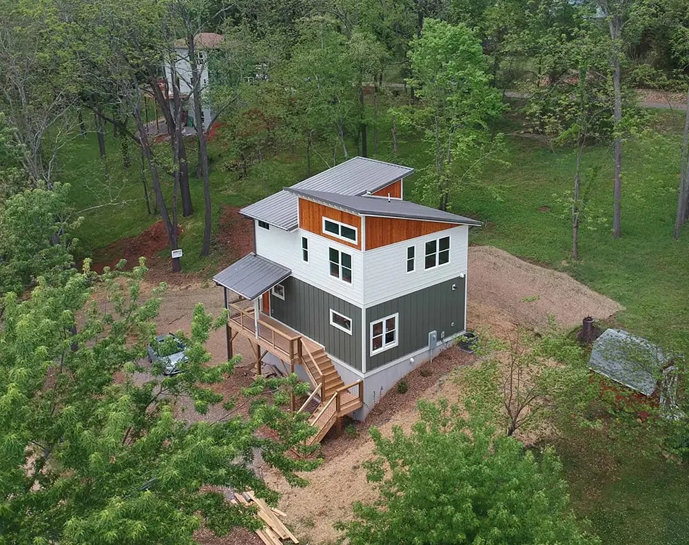 The Hillside Home is a three-level Craftsman home with a front porch and rear deck.