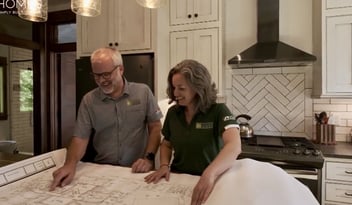 Kaizen Homes reviewing blueprints during the design-build process