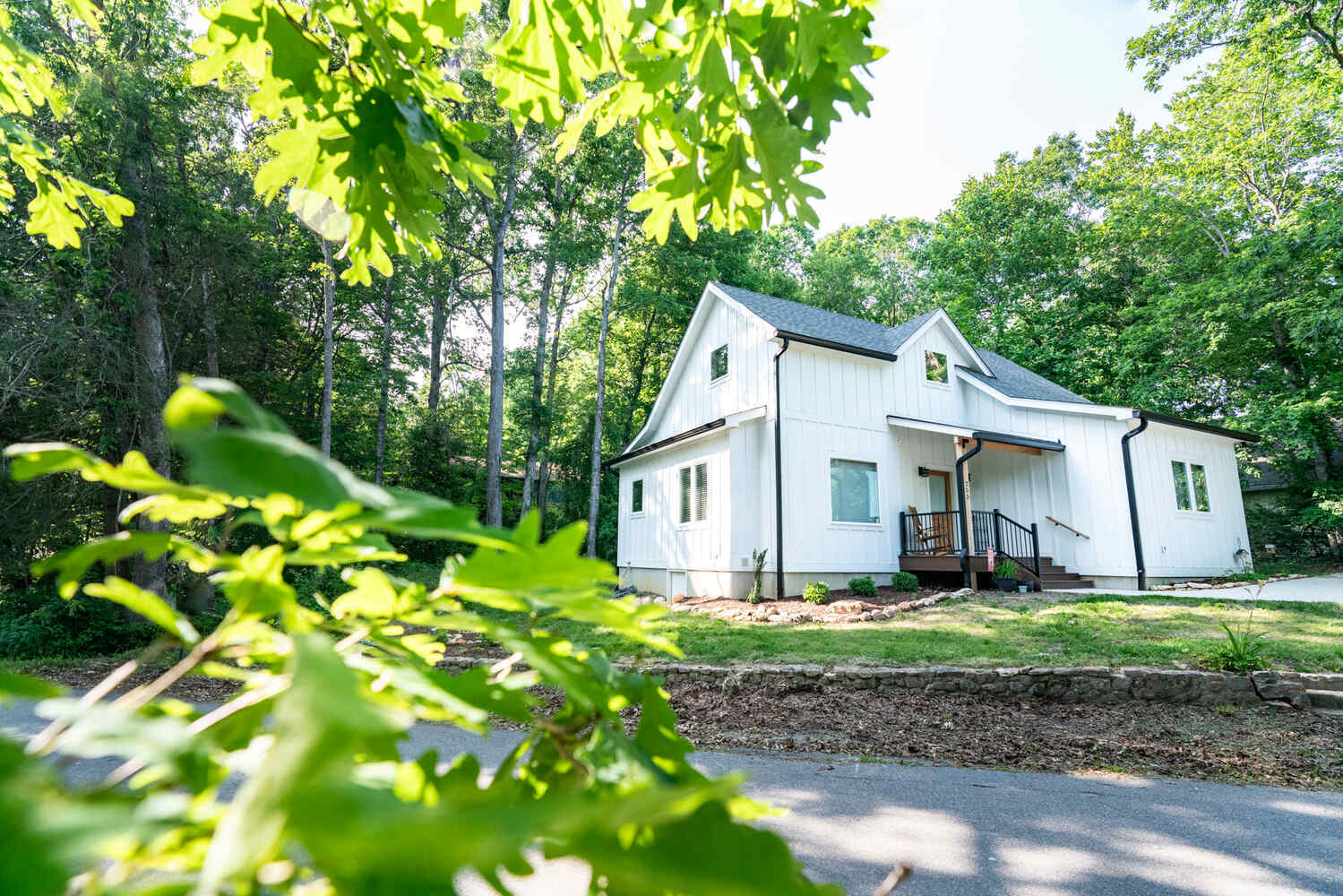 Scenic exterior of Kaizen Homes custom residence surrounded by trees
